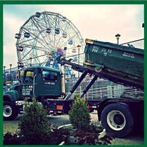 Atlas Roll-off dumpster truck