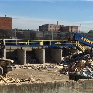 Disposal recycling facility with debris